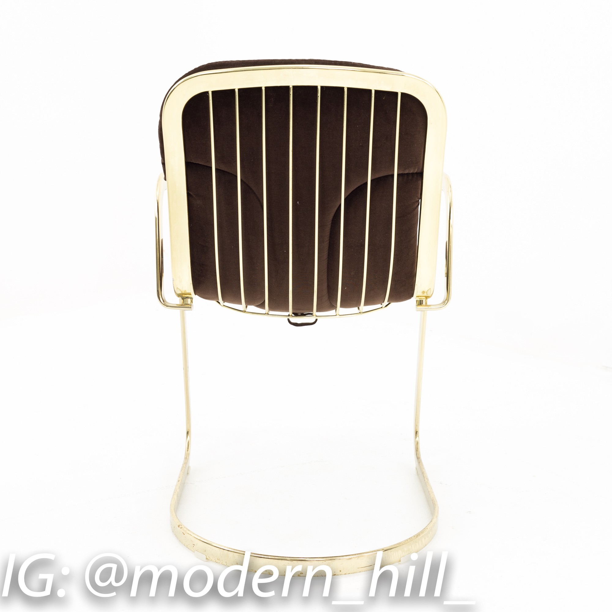 Brass cantilever outlet chair