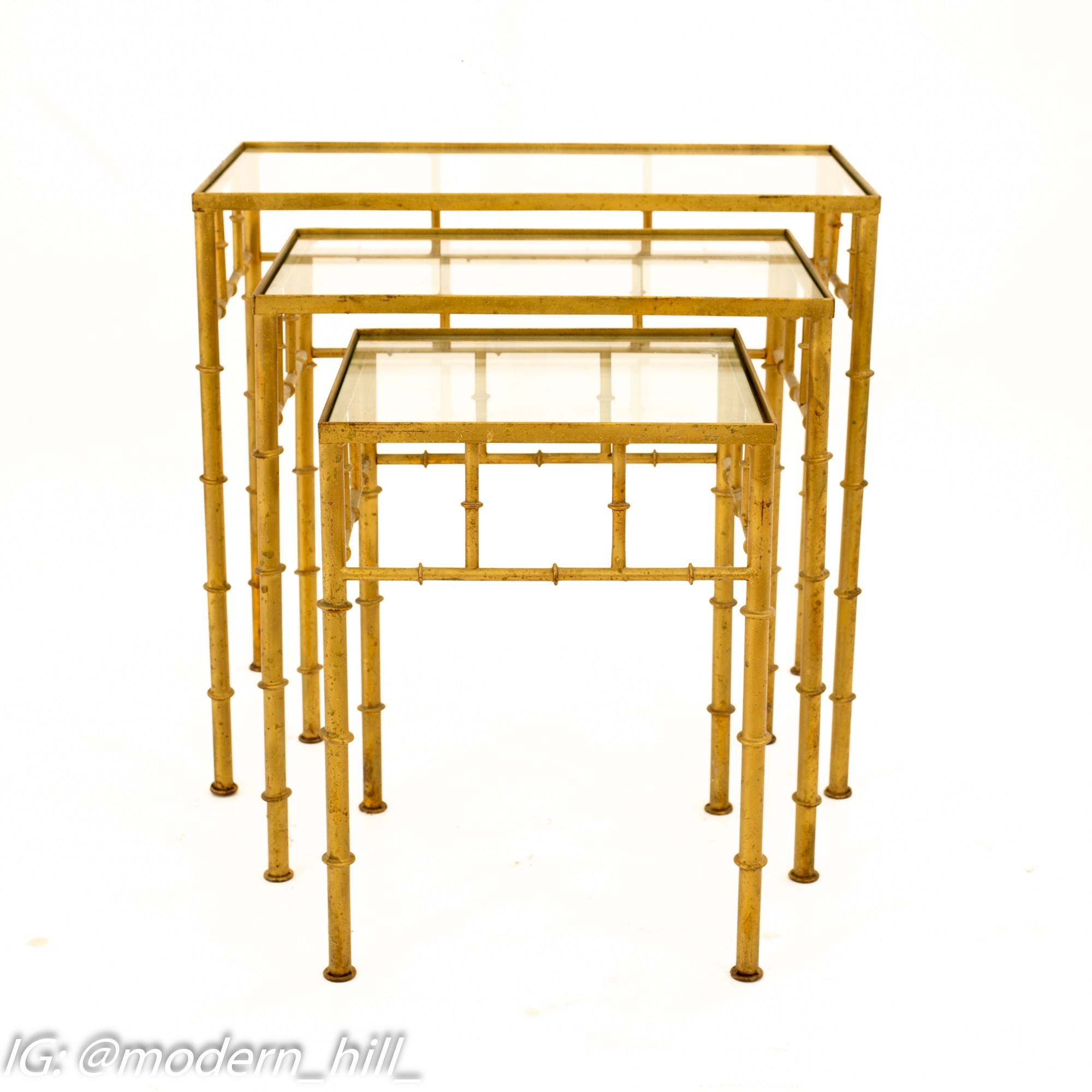 SOLD Nesting tables are timeless and this set is fabulous! ✨This vintage  gold metal faux bamboo trio with glass will add a little class