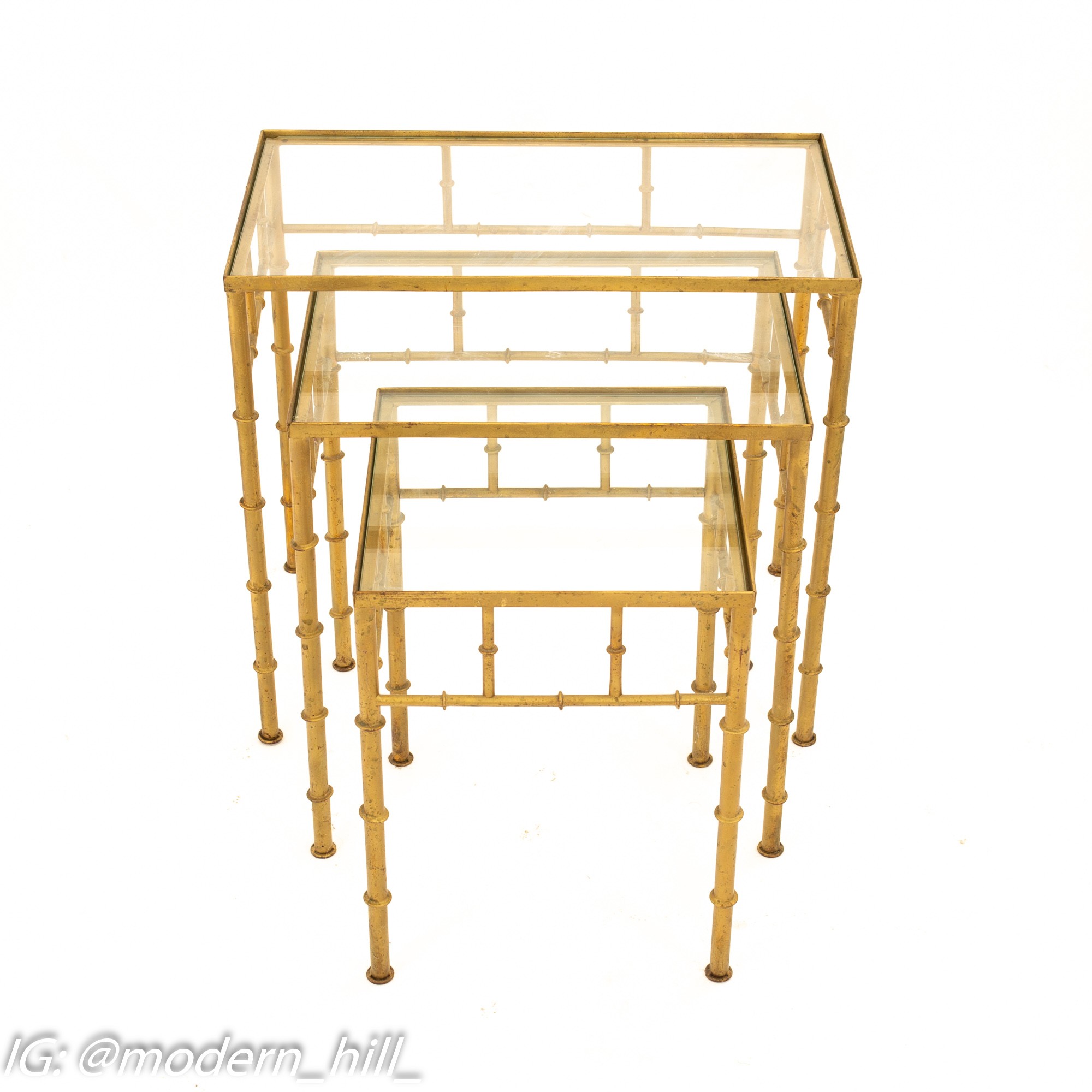SOLD Nesting tables are timeless and this set is fabulous! ✨This vintage  gold metal faux bamboo trio with glass will add a little class