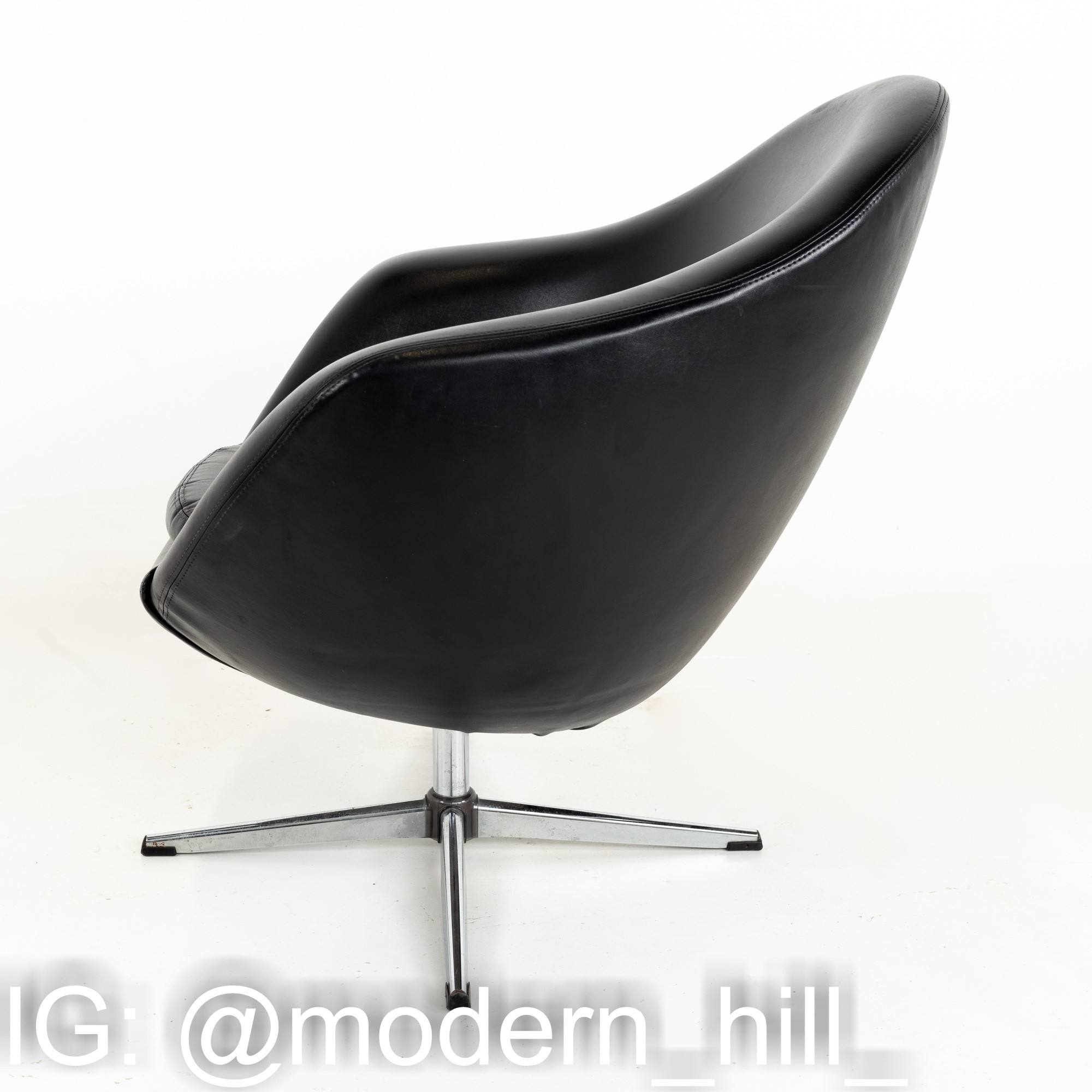 Overman Pod Mid Century Black Swivel Lounge Chair