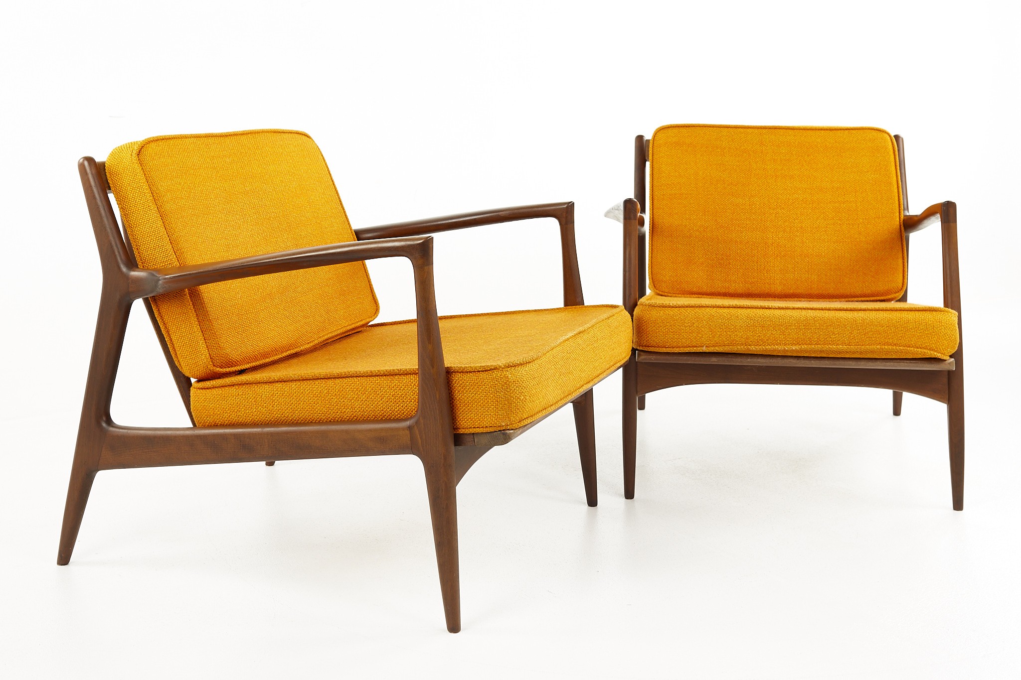 Kofod Larsen for Selig Mid Century Walnut Lounge Chairs - a Pair