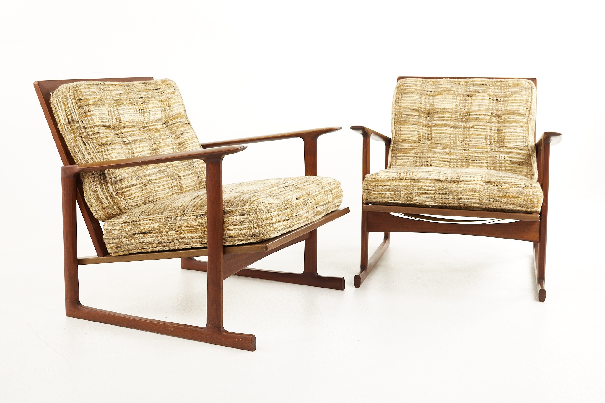 Kofod Larsen for Selig Mid Century Teak Sleigh Leg Lounge Chairs - a Pair