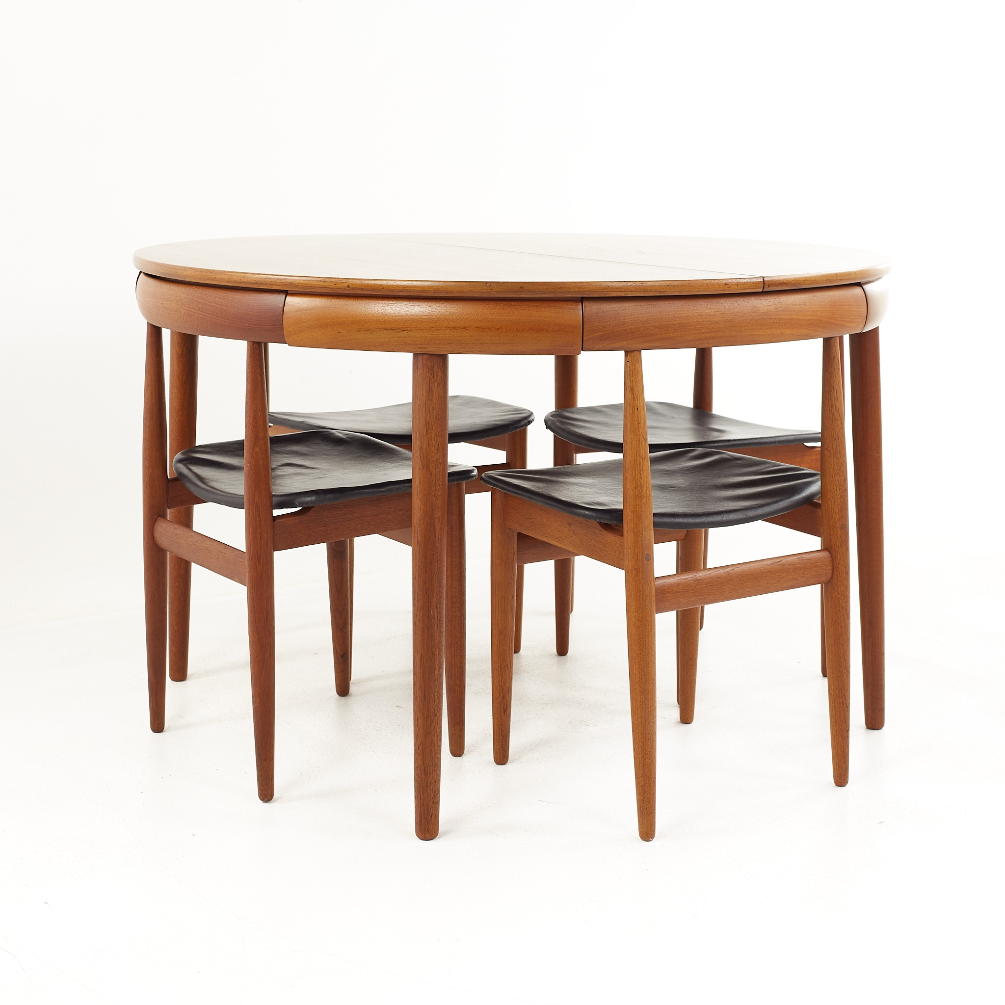 Frem Rojle Mid Century Teak Hidden Leaf Dining Table with 6 Nesting Chairs