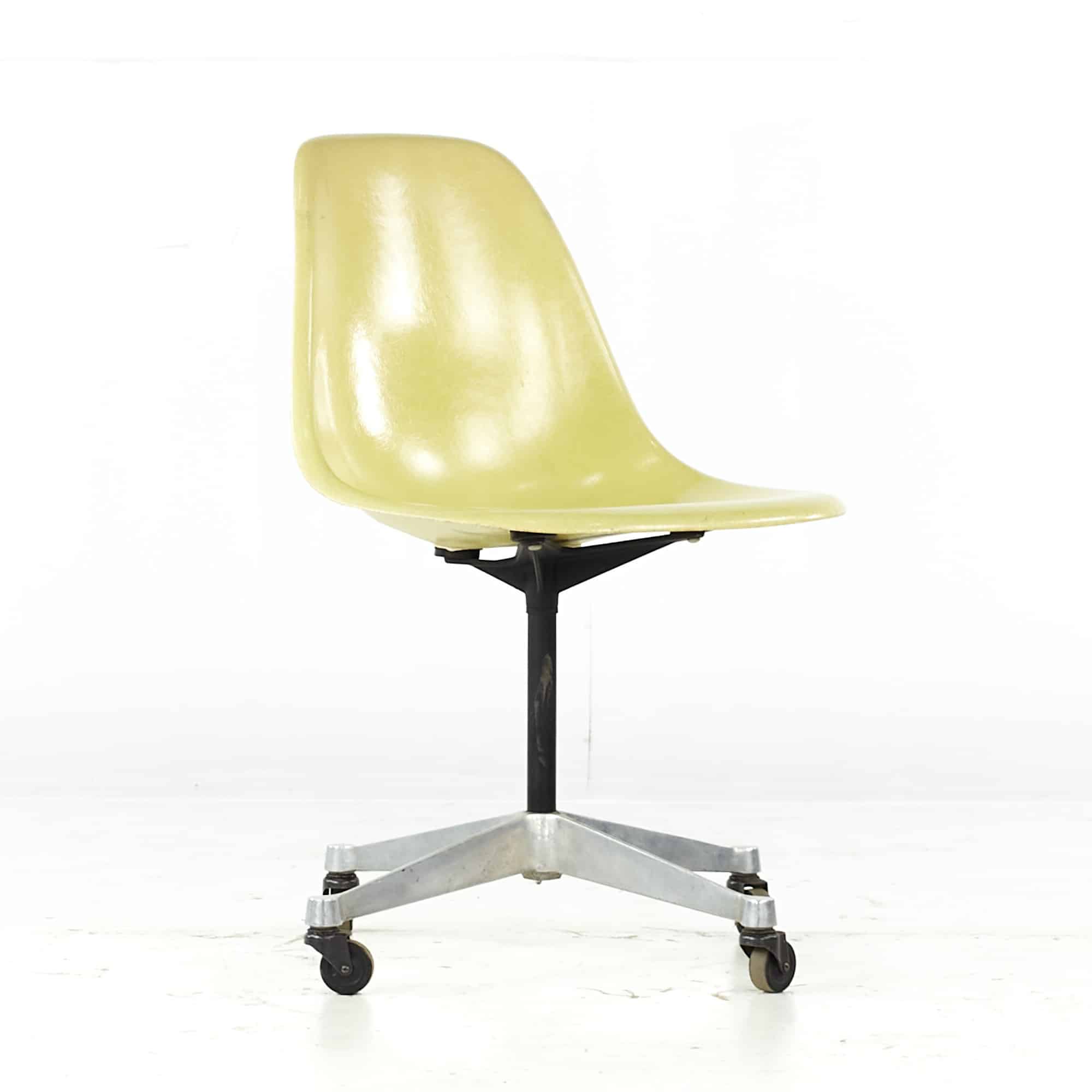 Charles and Ray Eames for Herman Miller Mid Century Fiberglass Wheeled Shell Chair
