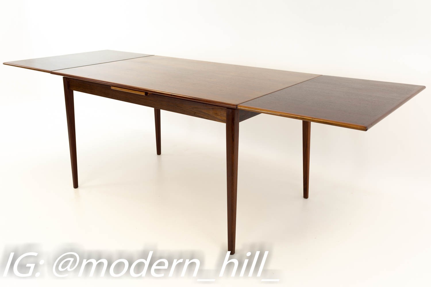 Knud Nielsen for Losning Mobelfabrik Rosewood Mid Century Hidden Leaf Dining Table