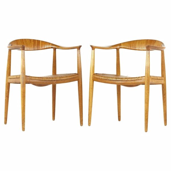 hans wegner mid century presidential teak and cane dining chairs - pair