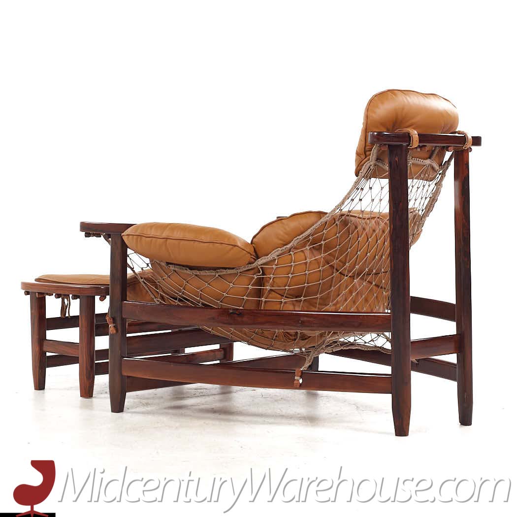Jean Gillon Jangada Mid Century Brazilian Rosewood and Leather Lounge Chairs with Ottomans - Pair