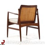 Kofod Larsen for Selig Mid Century Walnut and Cane Lounge Chairs - Pair