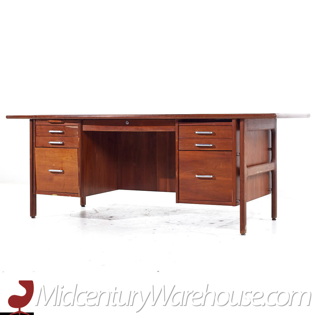 https://midcenturywarehouse.com/wp-content/uploads/2023/10/Standard-Furniture-Mid-Century-Walnut-Executive-Desk-3-1.jpg