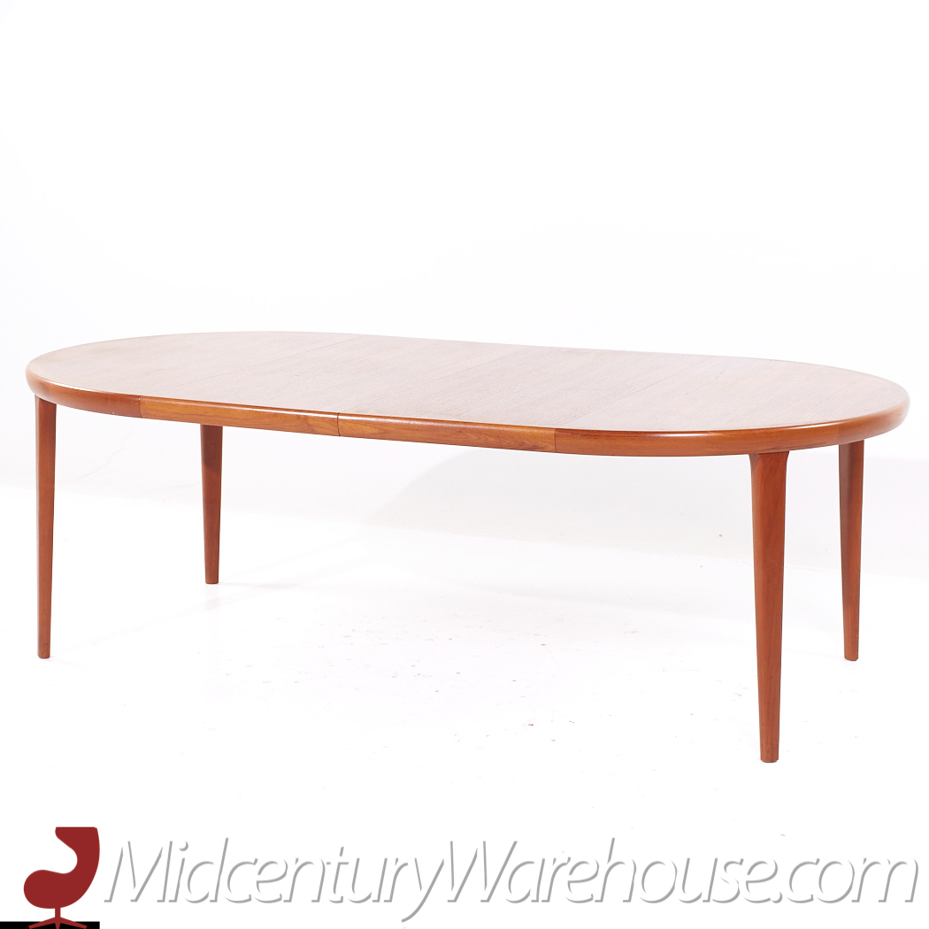 Kofod Larsen for Faarup Mobelfabrik Danish Teak Expanding Dining Table with 2 Leaves