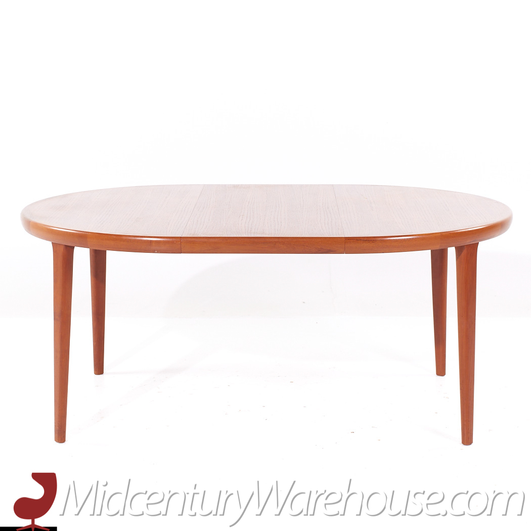 Kofod Larsen for Faarup Mobelfabrik Danish Teak Expanding Dining Table with 2 Leaves