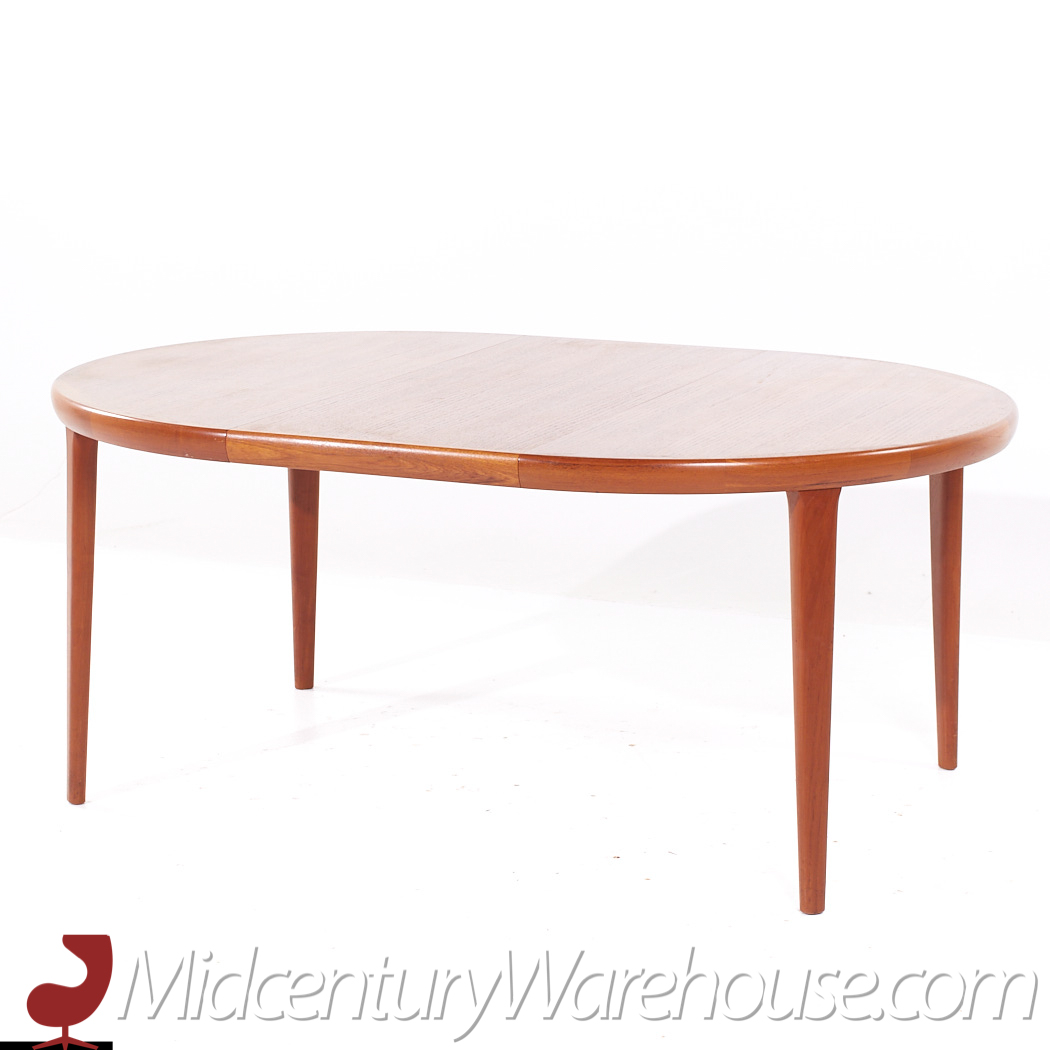 Kofod Larsen for Faarup Mobelfabrik Danish Teak Expanding Dining Table with 2 Leaves