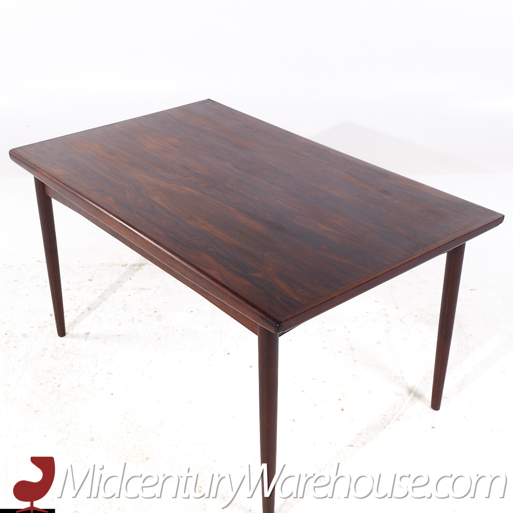 Johannes Nørgaard for Nørgaards Møbelfabrik Mid Century Danish Rosewood Hidden Leaf Dining Table