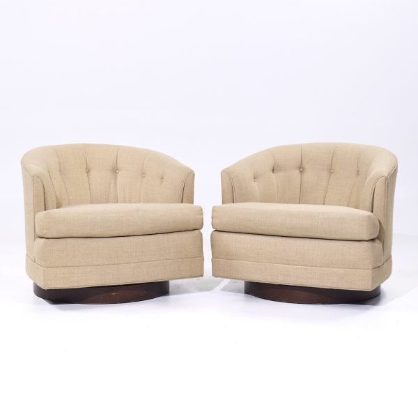 selig mid century walnut base swivel lounge chairs - pair