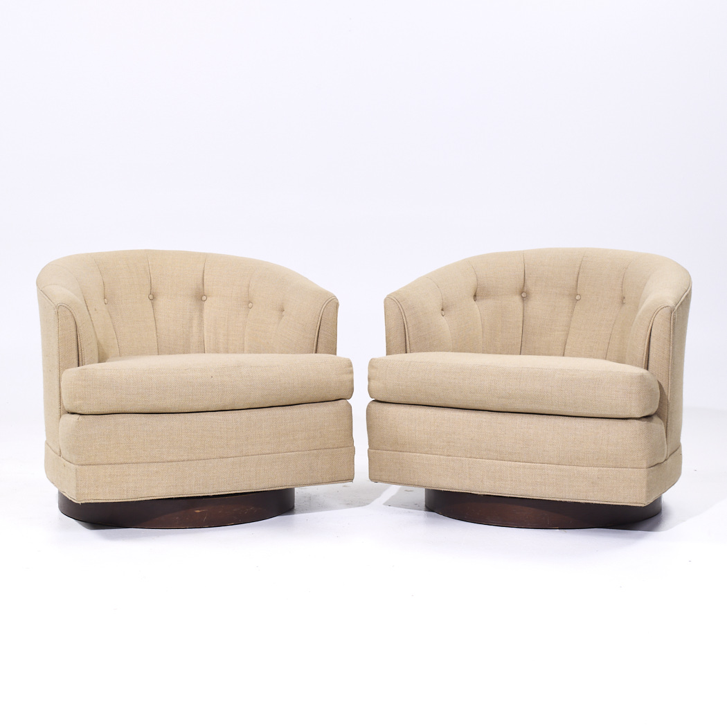 Selig Mid Century Walnut Base Swivel Lounge Chairs - Pair