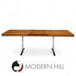 Poul Norreklit for Georg Petersens Mid Century Danish Rosewood and Chrome Hidden Leaf Expanding Dining Table