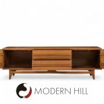 Young Manufacturing Mid Century Walnut Curverd Credenza and Hutch
