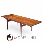 Kofod Larsen for Faarup Møbelfabrik Mid Century Teak Hidden Leaf Expanding Dining Table