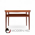 Kofod Larsen for Faarup Møbelfabrik Mid Century Teak Hidden Leaf Expanding Dining Table