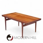 Kofod Larsen for Faarup Møbelfabrik Mid Century Teak Hidden Leaf Expanding Dining Table