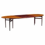 arne vodder for sibast mid century danish rosewood expanding oval dining table with 2 leaves