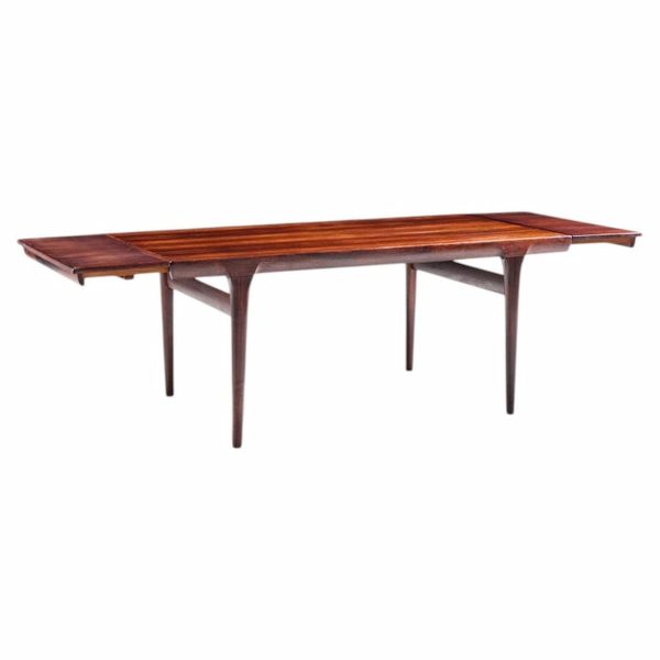 niels moller mid century danish rosewood hidden leaf expanding dining table with 2 leaves