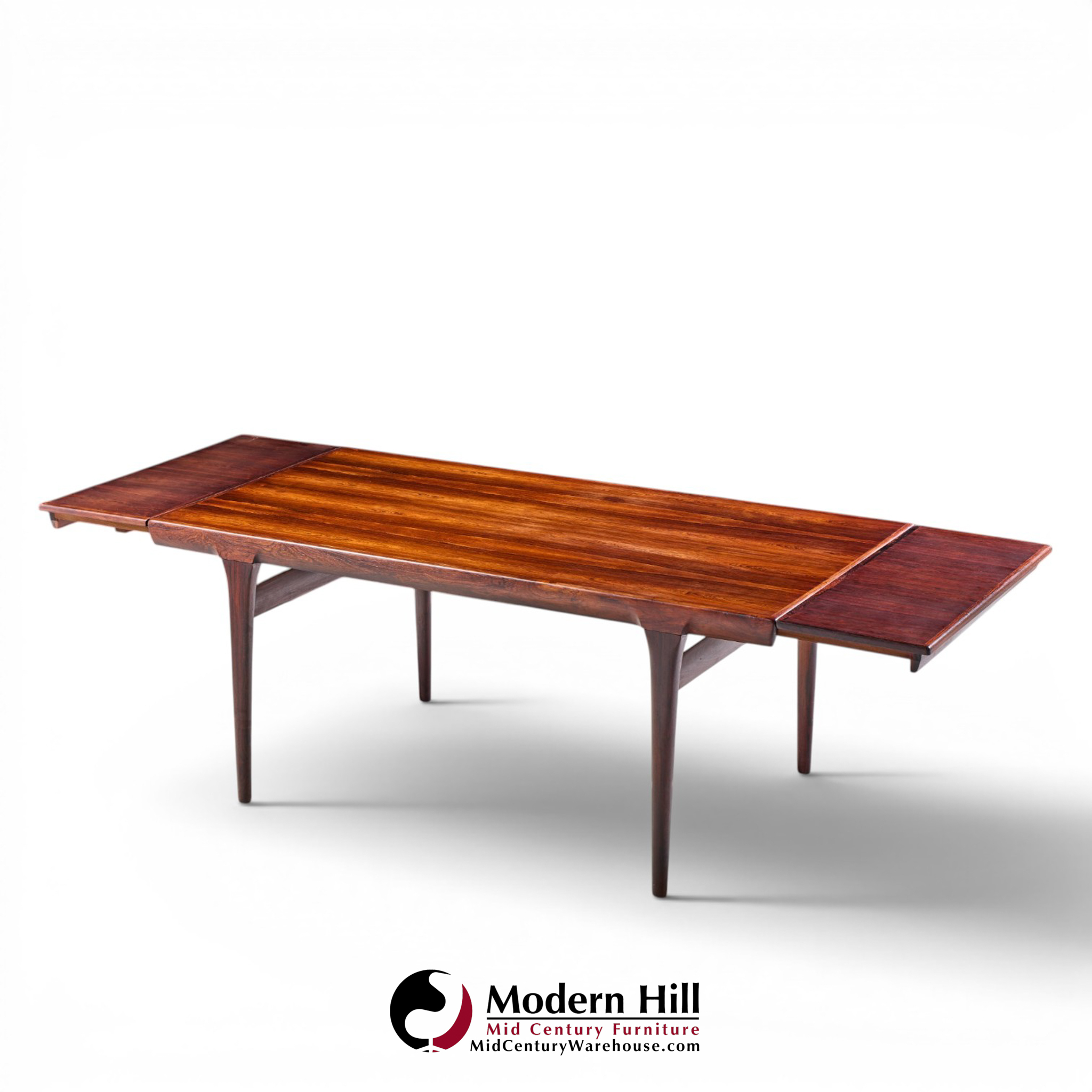 niels moller mid century danish rosewood hidden leaf expanding dining table with 2 leaves