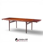 niels moller mid century danish rosewood hidden leaf expanding dining table with 2 leaves
