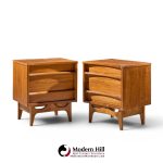 young manufacturing mid century walnut curved front nightstands - pair