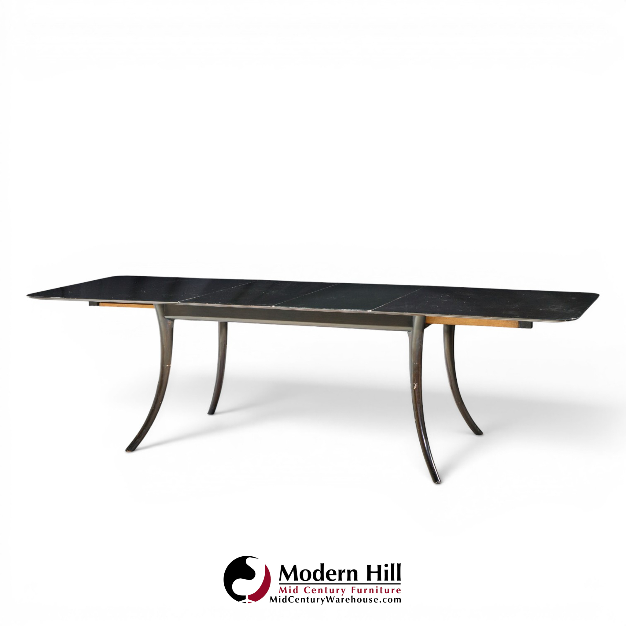 robsjohn gibbings for widdicomb mid century ebonized expanding saber leg dining table with 2 leaves