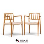niels moller model 66 mid century danish teak arm dining chairs - pair