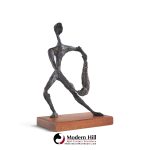 simon gordon mid century brutalist iron sculpture man with fish