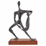 simon gordon mid century brutalist iron sculpture man with fish